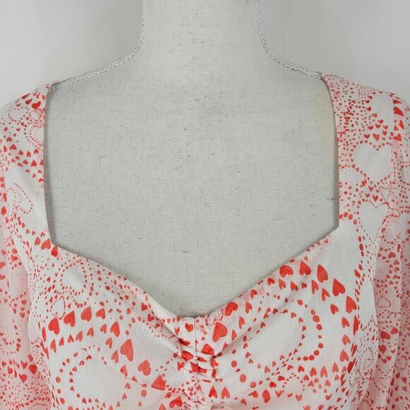 NWT BCBGeneration Heart Print Flutter Waist Peplum Sheer Fluted Sleeves Top M - Picture 2 of 13